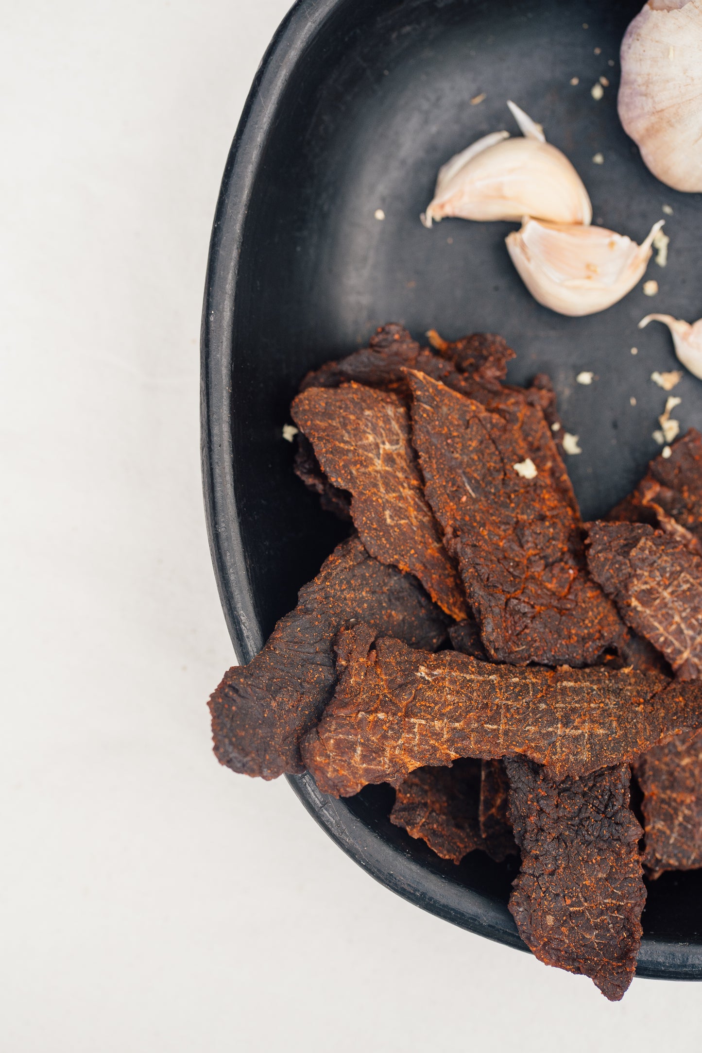 a nice presentation of the sweet and spicy tof beef jerky. 